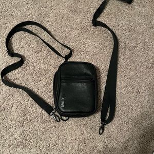 Brixley black bag. Convertible to cross body and backpack. Extra strap included